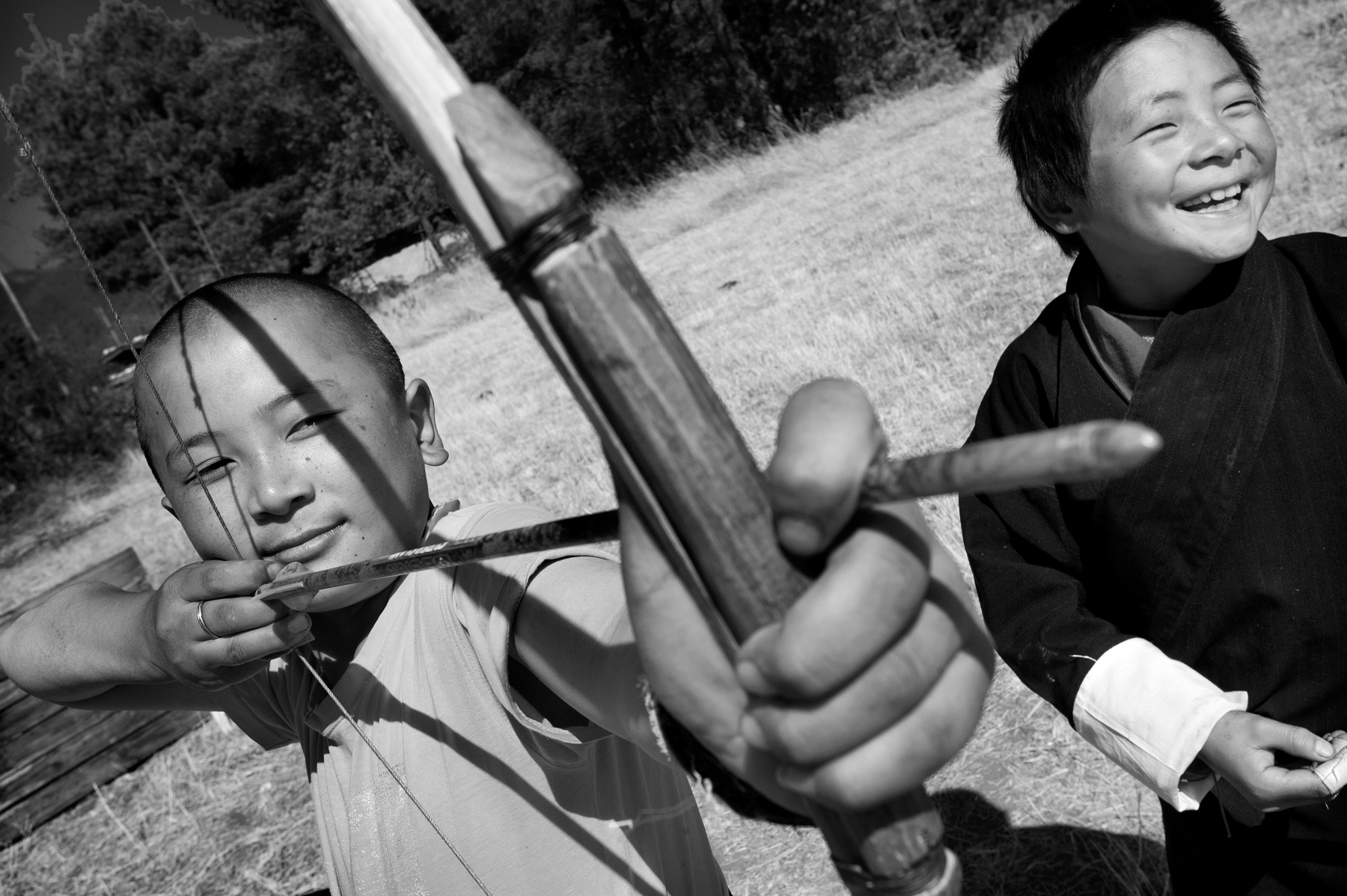 JoshuaBright_Bhutan_Bhutanese_Happiness_BuddhistMonk_TempleofDivineMadman_Archery